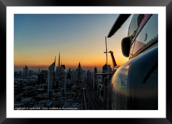 Aerial Dubai sunset helicopter flying Sheikh Zayed Road Framed Mounted Print by Spotmatik 