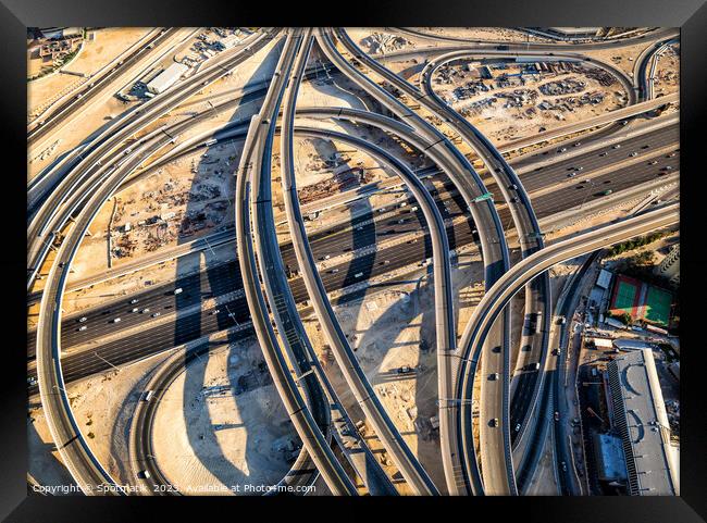 Aerial overhead view Dubai Sheikh Zayed Road Highway  Framed Print by Spotmatik 