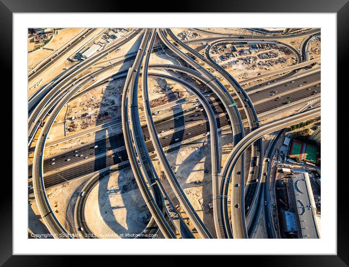 Aerial overhead view Dubai Sheikh Zayed Road Highway  Framed Mounted Print by Spotmatik 