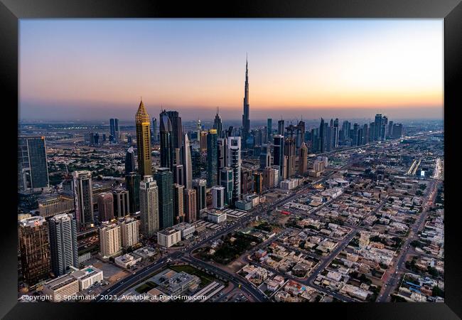 Aerial skyline view of Dubai city skyscrapers UAE Framed Print by Spotmatik 