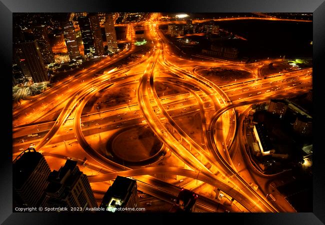 Aerial Dubai view Sheikh Zayed Road at night  Framed Print by Spotmatik 