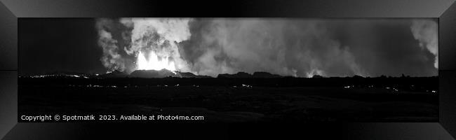 Panoramic view of active Icelandic volcanic eruption Framed Print by Spotmatik 