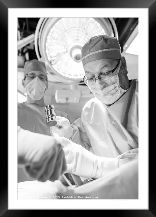 Surgeon operating on patient Hospital Research Framed Mounted Print by Spotmatik 