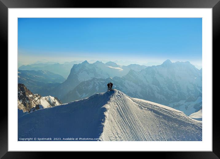 Aerial Switzerland two climbers on mountain summit Europe Framed Mounted Print by Spotmatik 
