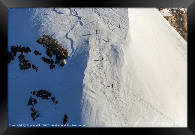 Aerial Switzerland mountain team climbing snow face Europe Framed Print by Spotmatik 