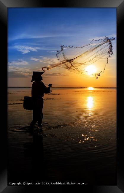 Indian ocean Balinese fisherman at sunrise fishing Indonesia Framed Print by Spotmatik 