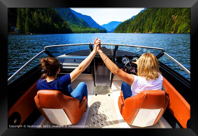 Vancouver Caucasian females out celebrating in powerboat Canada Framed Print by Spotmatik 