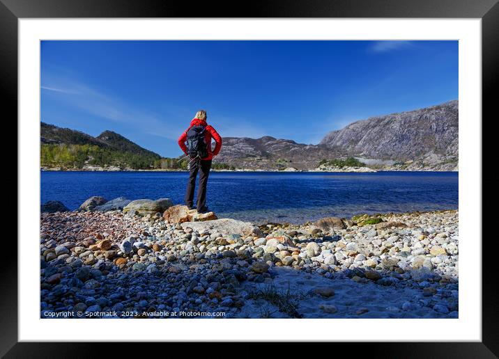 Norway female Hiker scenic beauty of Norwegian fjord  Framed Mounted Print by Spotmatik 