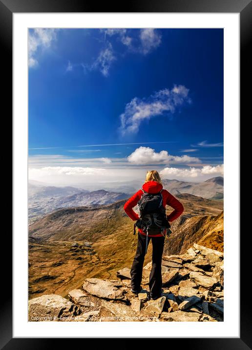 Young female hiker Hiking on mountain summit Wales Framed Mounted Print by Spotmatik 