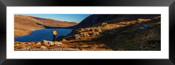 Panoramic lake among mountains with female hiker Snowdonia Framed Mounted Print by Spotmatik 