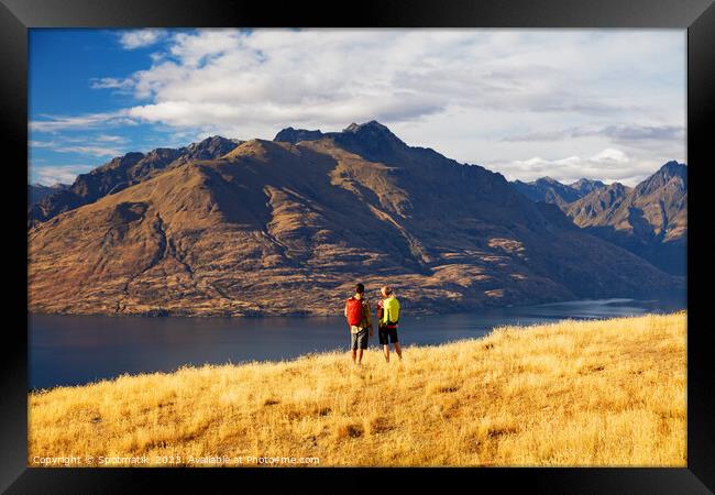 Young Couple Backpackers outdoor hiking The Remarkables Framed Print by Spotmatik 
