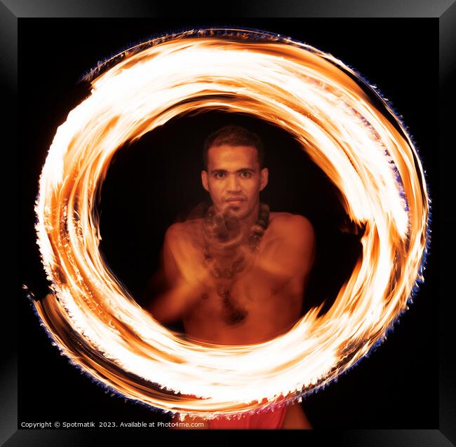 Male Polynesian Fire dancer performing Ring of Fire  Framed Print by Spotmatik 
