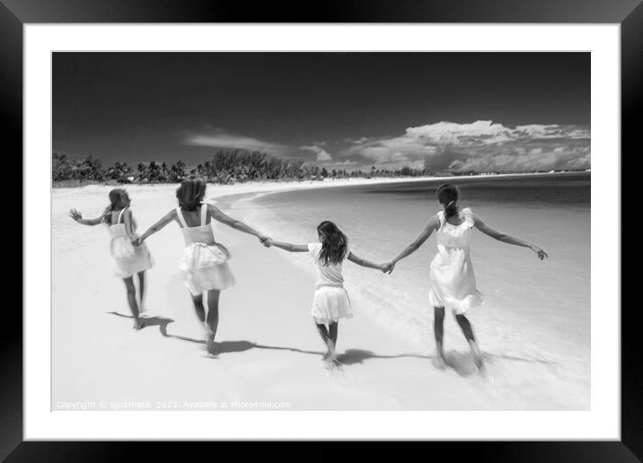 Happy Beach family in white walking holding hands  Framed Mounted Print by Spotmatik 