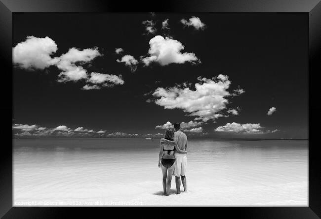 Happy travel couple together on beach holiday Caribbean Framed Print by Spotmatik 