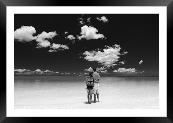 Happy travel couple together on beach holiday Caribbean Framed Mounted Print by Spotmatik 