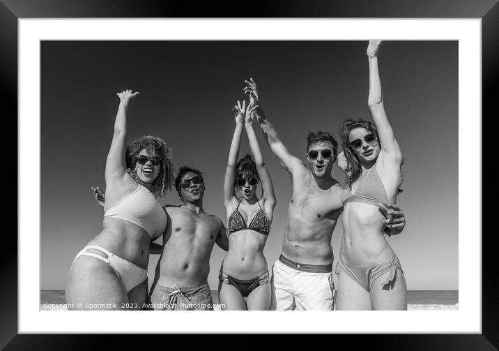 Beach party fun friends in swimwear enjoying vacation Framed Mounted Print by Spotmatik 