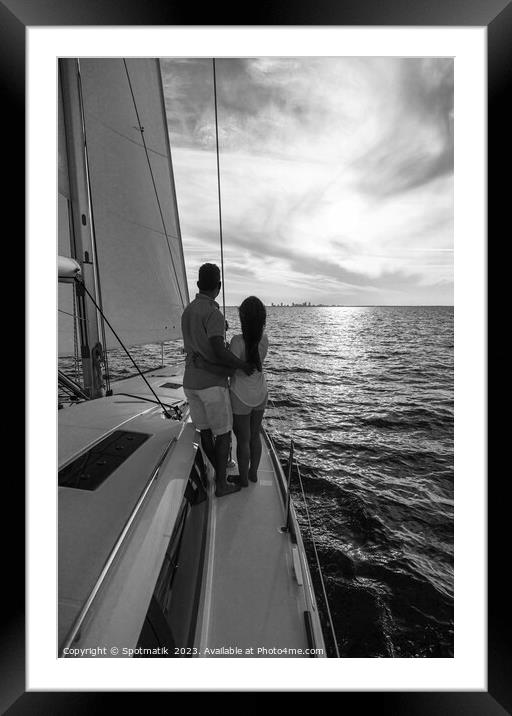 Sunrise view for Latin American couple on yacht Framed Mounted Print by Spotmatik 