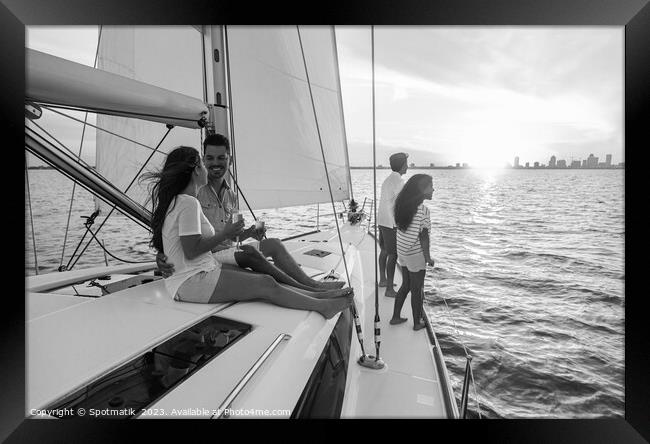 Fun family vacation on luxury yacht at sunrise Framed Print by Spotmatik 