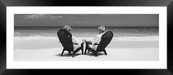Panoramic senior couple enjoying tranquility on tropical island Framed Mounted Print by Spotmatik 