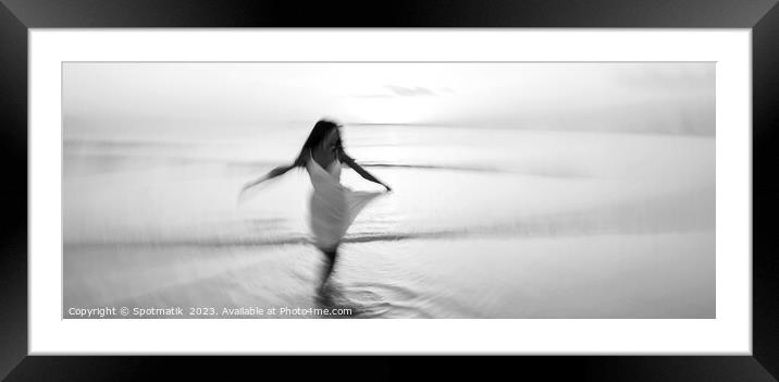 Panoramic motion blurred ocean sunset with dancing girl Framed Mounted Print by Spotmatik 