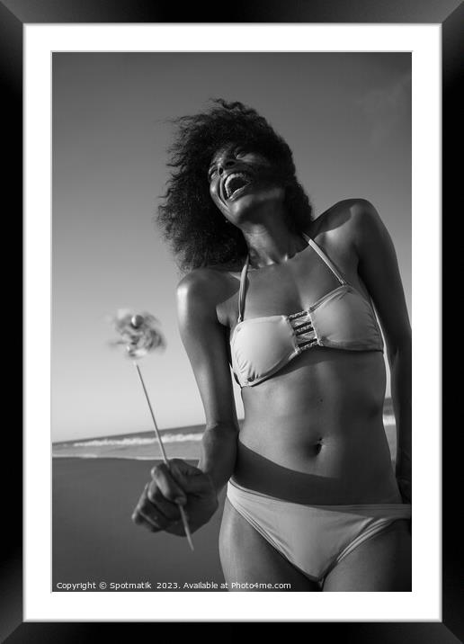 Young African American female having fun on beach Framed Mounted Print by Spotmatik 