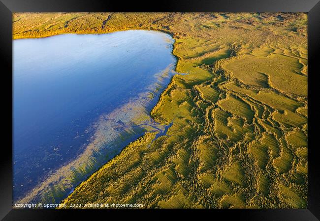 Aerial Wilderness view of McClelland lake Ft McMurray  Framed Print by Spotmatik 