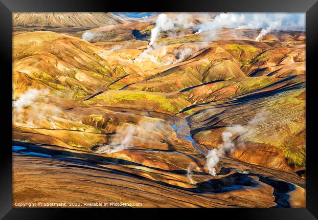 Aerial natural steam rising from steam fissures Landmannalaugar  Framed Print by Spotmatik 
