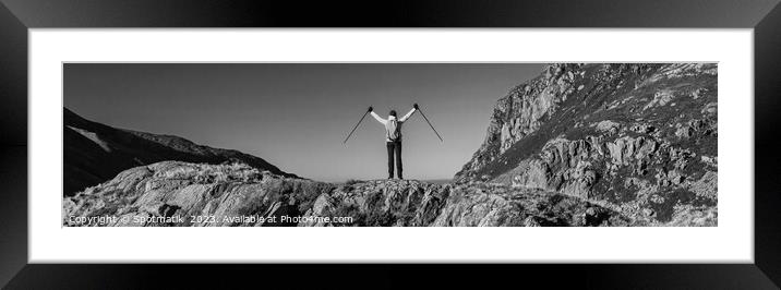 Panoramic happy female backpacker nearing mountain summit Framed Mounted Print by Spotmatik 