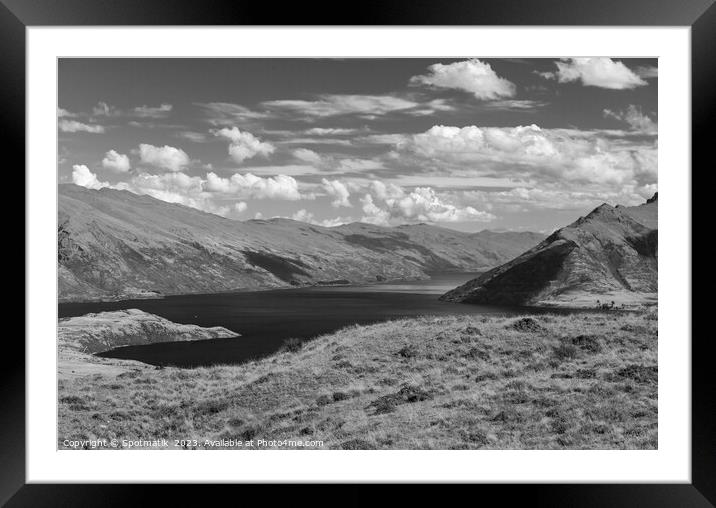 Scenic views with lake in remote mountainous landscape Framed Mounted Print by Spotmatik 