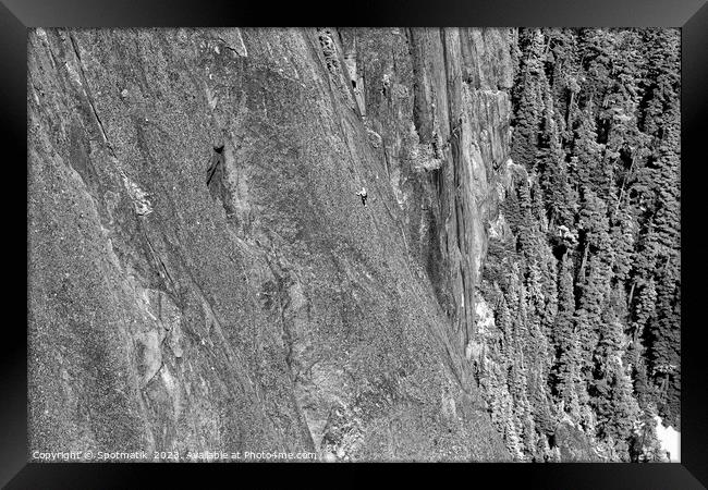 Aerial male climber rocky cliff face Squamish Canada  Framed Print by Spotmatik 