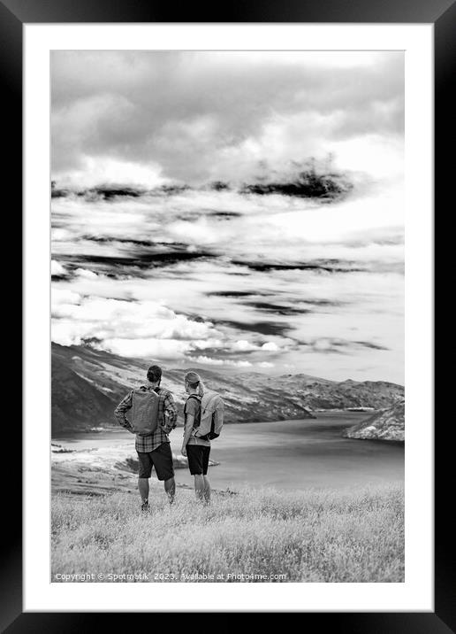 New Zealand Male female hikers trekking The Remarkables Framed Mounted Print by Spotmatik 