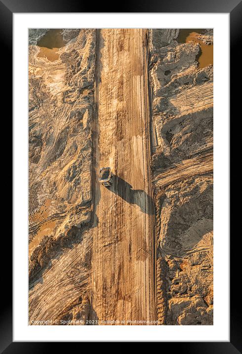 Aerial view Oilsands mining area large dump trucks  Framed Mounted Print by Spotmatik 