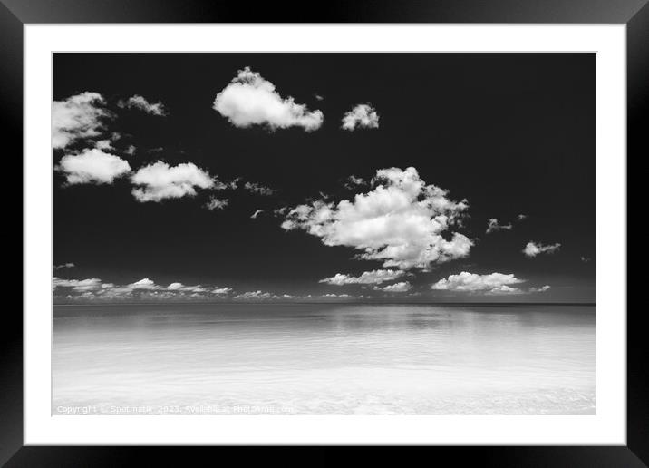 View of blue ocean and white sandy beach Framed Mounted Print by Spotmatik 