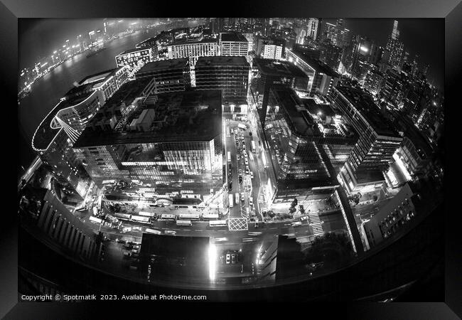 Hong Kong illuminated city traffic and skyscrapers downtown Framed Print by Spotmatik 