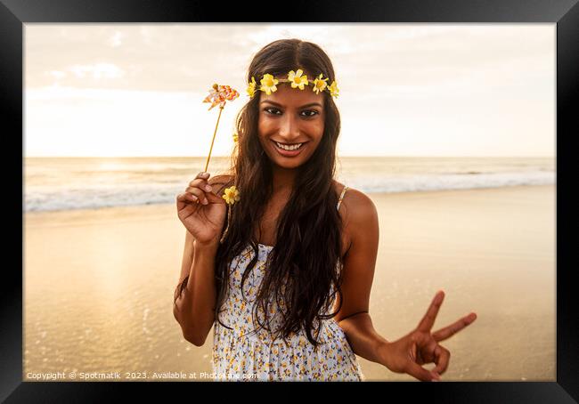 Freedom outdoors for smiling Indian girl by ocean Framed Print by Spotmatik 