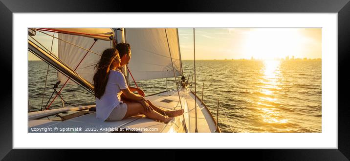 Panorama of young Hispanic couple at leisure on luxury yacht Framed Mounted Print by Spotmatik 