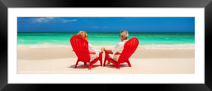 Panoramic senior couple enjoying tranquility on tropical island Framed Mounted Print by Spotmatik 