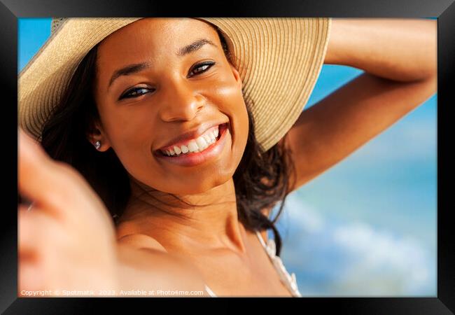Portrait of smiling African American girl wearing hat Framed Print by Spotmatik 