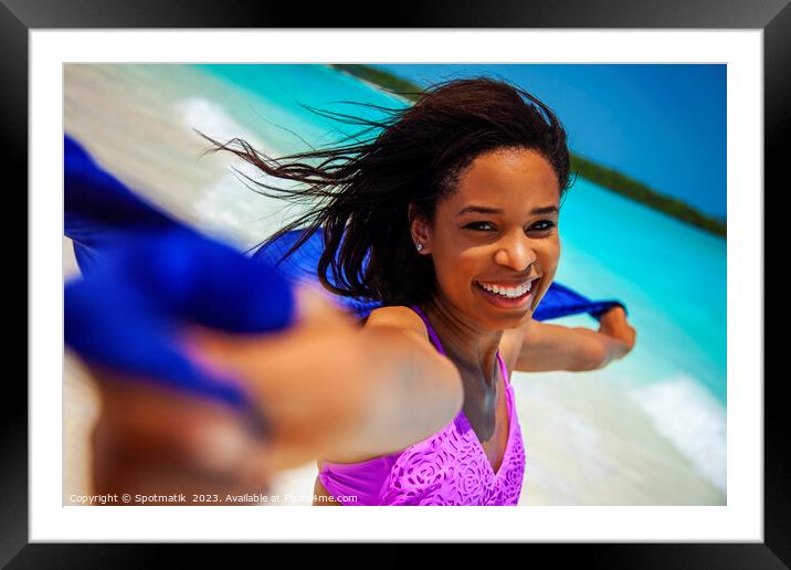 Close up smiling girl on beach holding scarf Framed Mounted Print by Spotmatik 