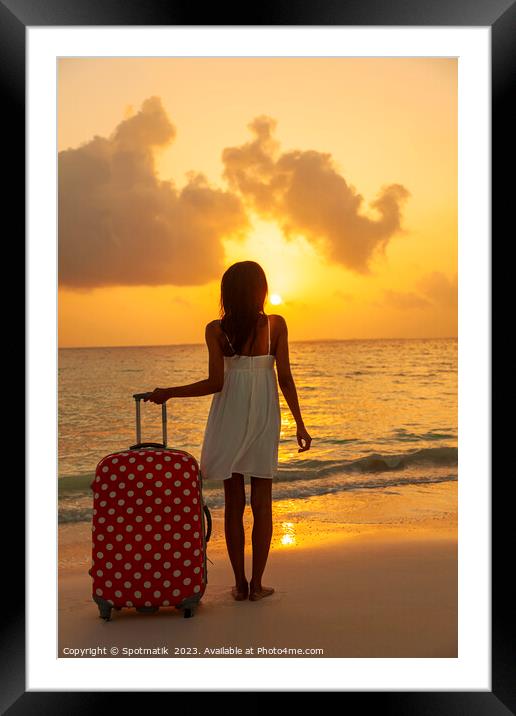 Young woman with suitcase enjoying tropical ocean sunrise Framed Mounted Print by Spotmatik 
