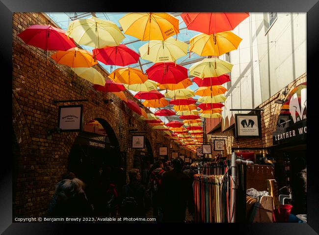 Camden Town Umbrella's  Framed Print by Benjamin Brewty