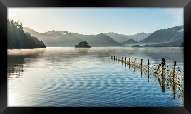 Derwent Water and early morning sunrays Framed Print by Julian Carnell