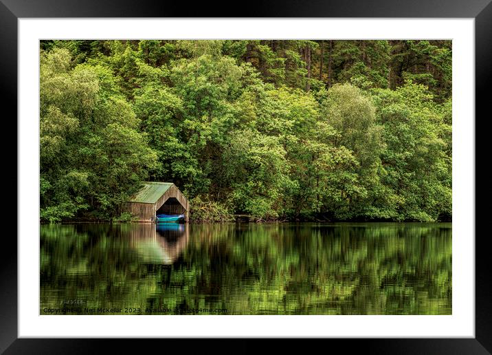 Mirrored Boat in the Boathouse Framed Mounted Print by Neil McKellar