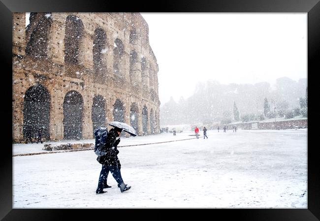 The Colosseum under heavy snow Framed Print by Fabrizio Troiani