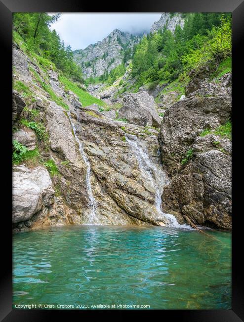 Small waterfall with the water flowing through the rock in a natural pool with turquoise color Framed Print by Cristi Croitoru