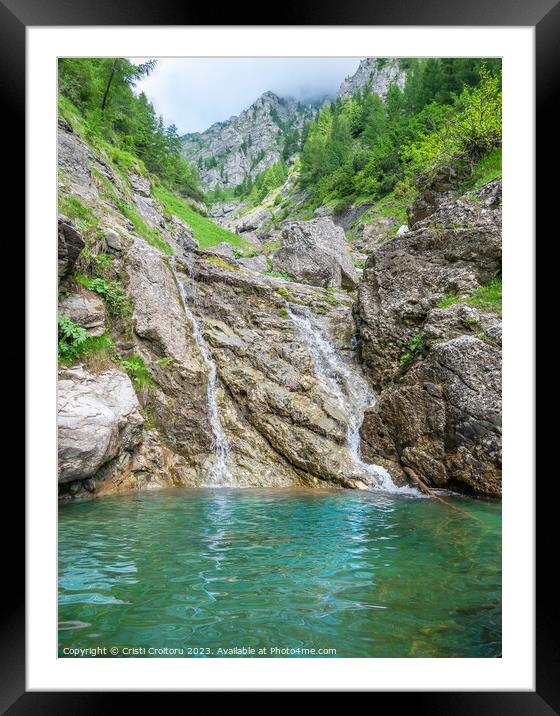 Small waterfall with the water flowing through the rock in a natural pool with turquoise color Framed Mounted Print by Cristi Croitoru