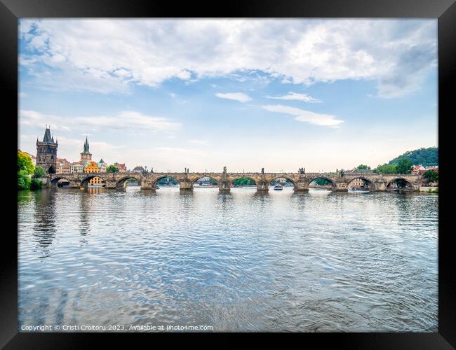 Charles Bridge over Vltava river in Prague. Framed Print by Cristi Croitoru