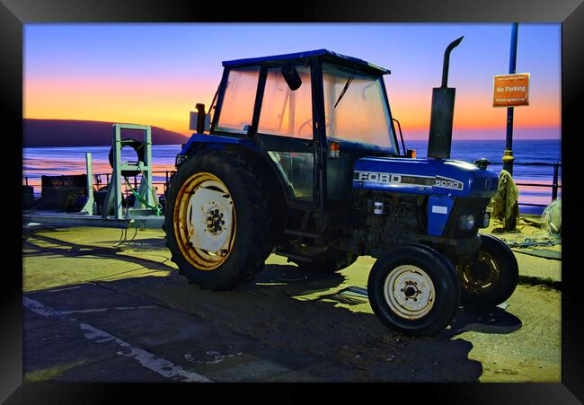 Filey Tractor Sunrise Framed Print by Steve Smith