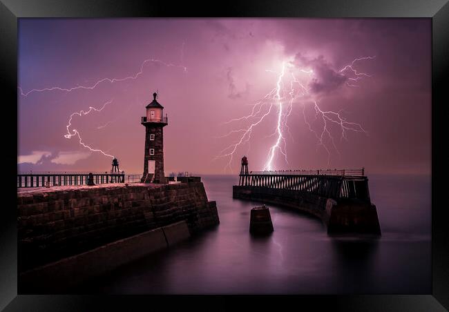 Lightning out to sea from Whitby Pier Framed Print by Tim Hill