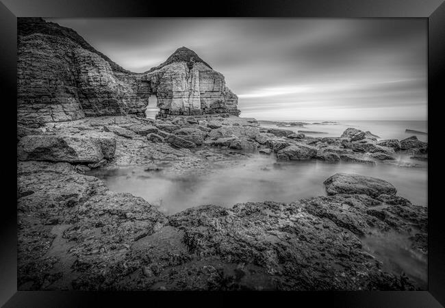 Thornwick Bay Cliff Arch in Black and White Framed Print by Tim Hill